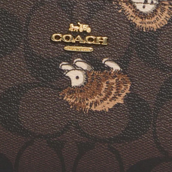 Coach Slim Wallet In Signature Canvas With Hedgehog Print
Gold/Brown Black Multi - Picture 4 of 16
